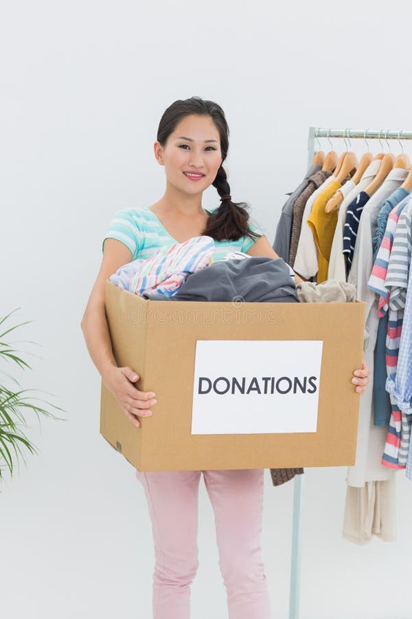 Smiling Young Woman Carrying Clothes Donation Stock Image Image of