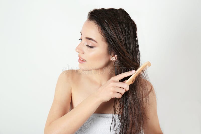 Young Woman Combing Hair after Shower Stock Image - Image of hair, healthy: 111679059 Young Woman Combing Hair after Shower Stock Image - Image of hair, healthy: 111679059