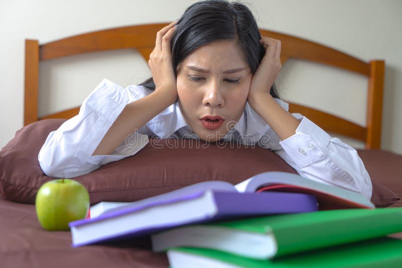 young woman concentrate reading book. education assessment concept. Student studying college exam, homework at university. royalty free stock photos young woman concentrate reading book. education assessment concept. Student studying college exam, homework at university. royalty free stock photos