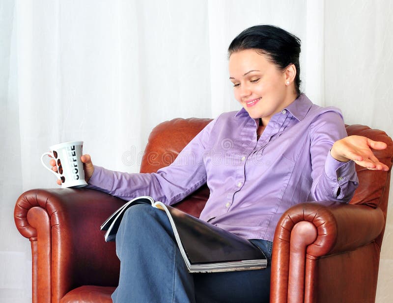 Young woman with cup of coffee