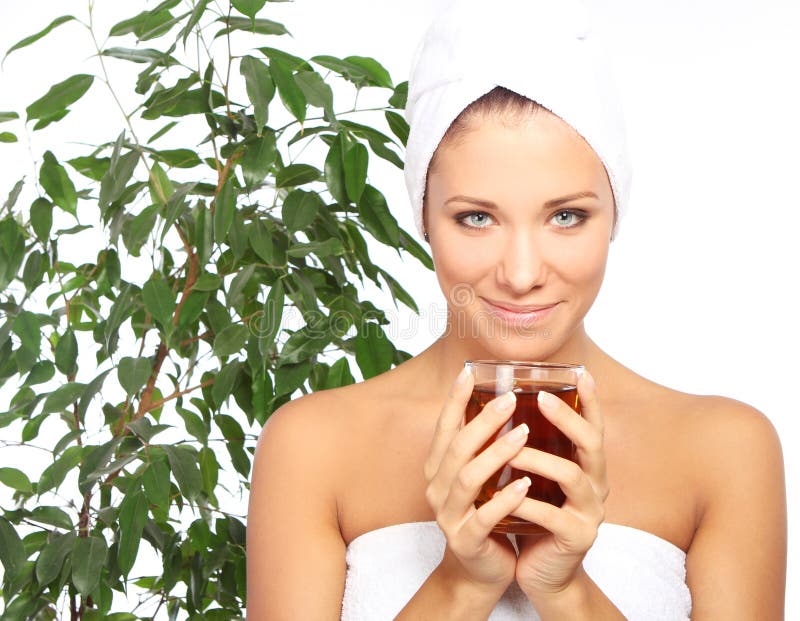 Young woman with cup of hot tea