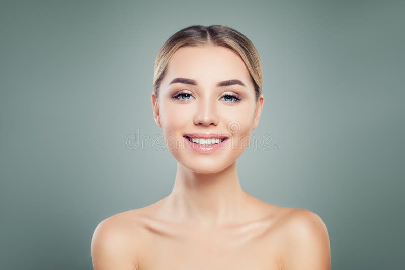 Young woman with cute smile. Beautiful smiling model portrait