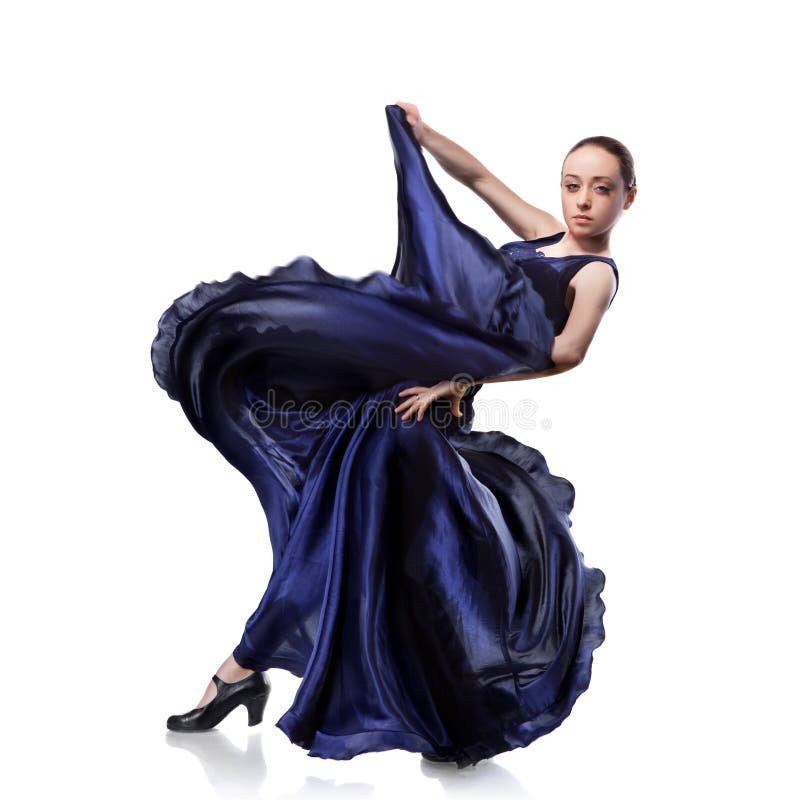 Young woman dancing flamenco on white