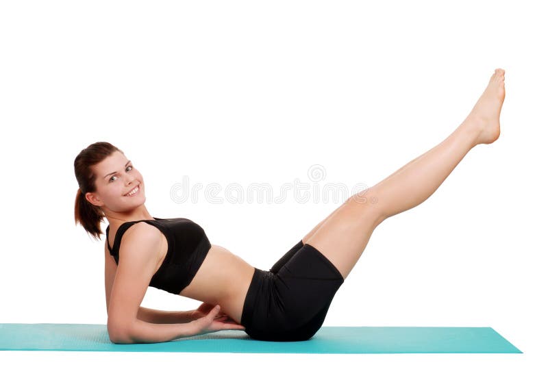 Young woman doing leg lift