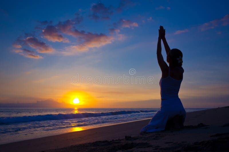 Young woman doing yoga exercise