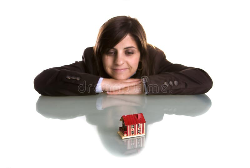Young woman dreaming with new house