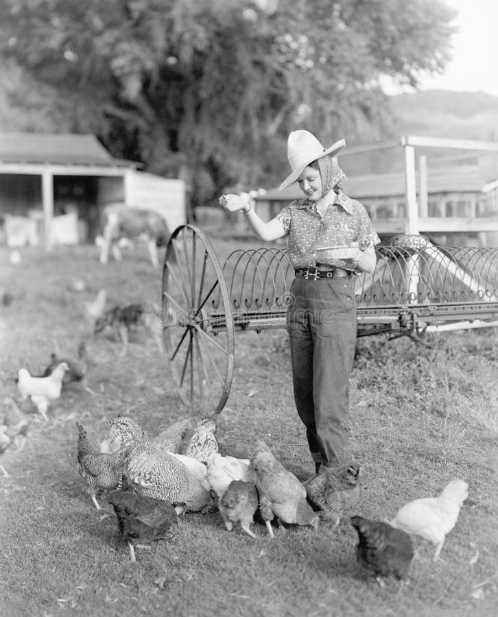 Premium Photo  Outdoor mature woman farmer holding in hands two small newborn  baby chickens, country rustic style, golden hour