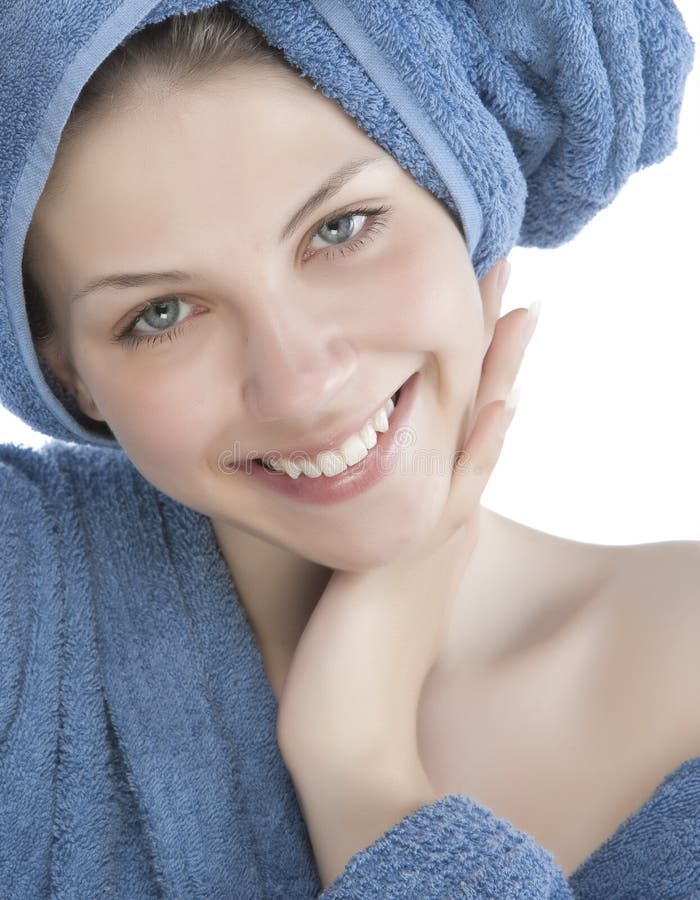 Young woman dressed blue bathrobe