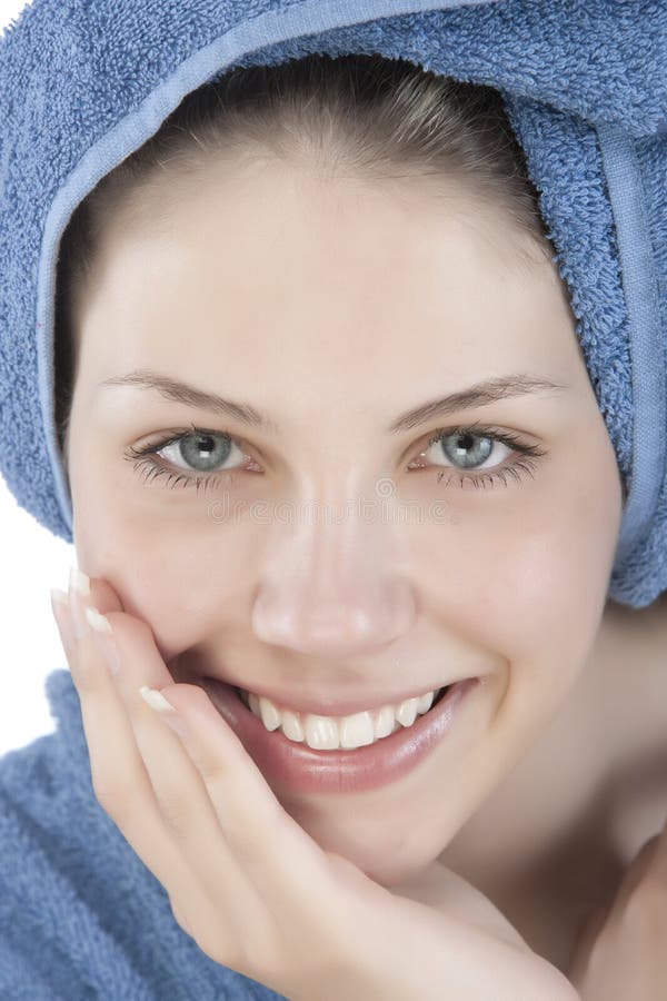 Young woman dressed blue bathrobe