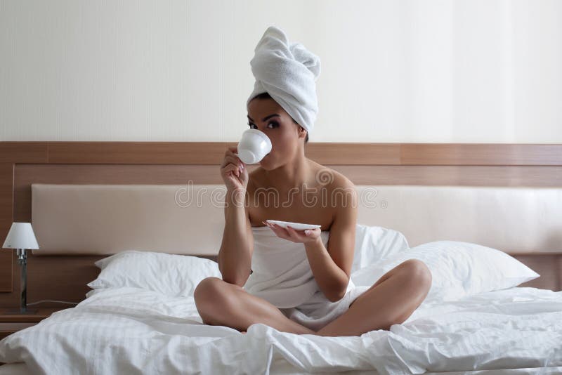 Young Woman Drinking Coffee in Bed Stock Image Image of full, towel