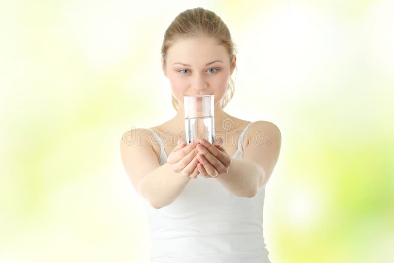 Young woman drinking fresh cold water