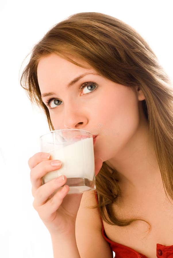 Young woman drinking milk