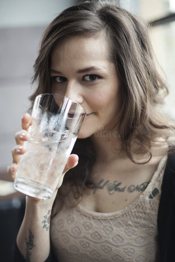 Young Woman Drinking a Pint Glass of Ice Water Stock Photo Image of