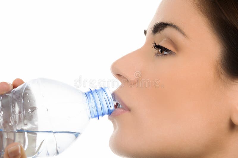 Young woman drinking water