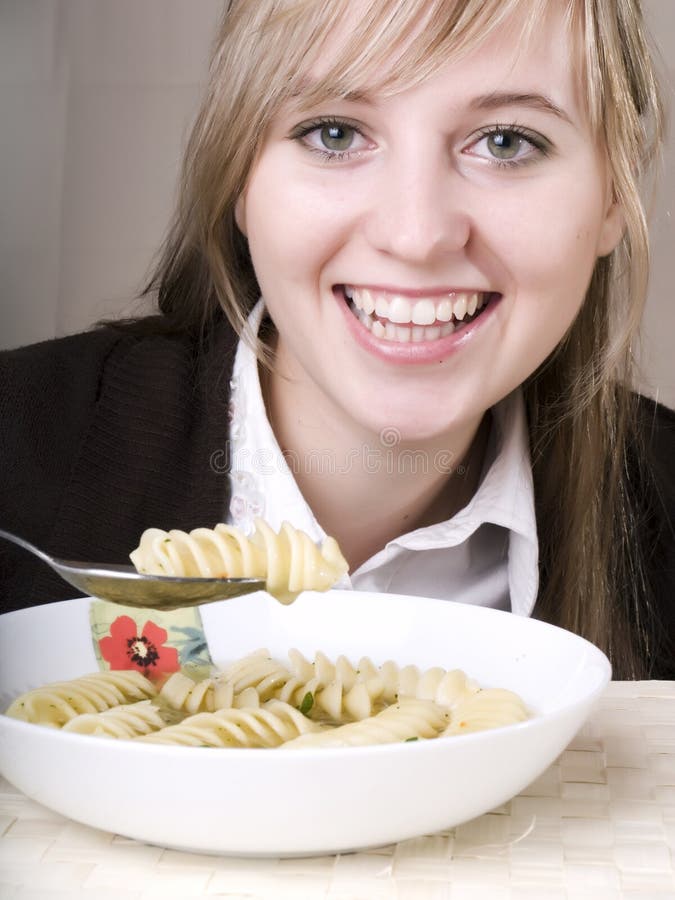 Young woman eating royalty free stock image