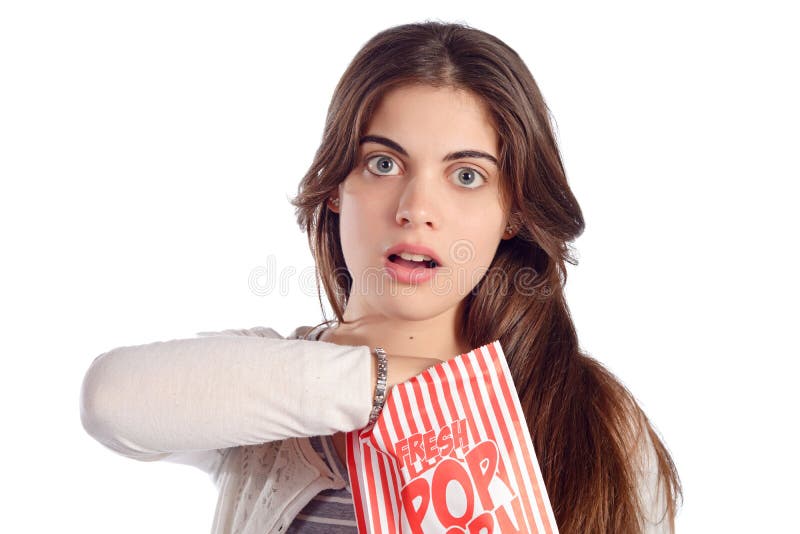 Young woman eating popcorn stock image. Image of beauty 81208449
