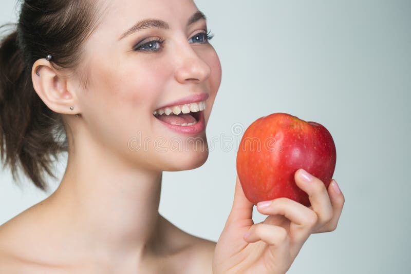 Young Woman Eating Red Apple Stock Image Image of model, beautiful