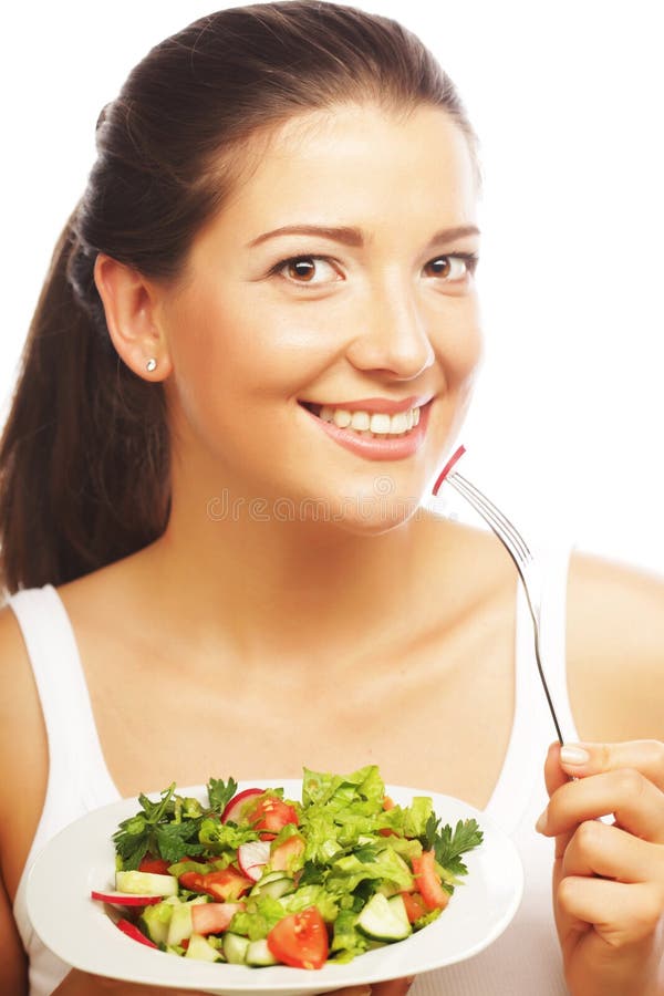 Young woman eating salat stock photo. Image of lettuce 39666338