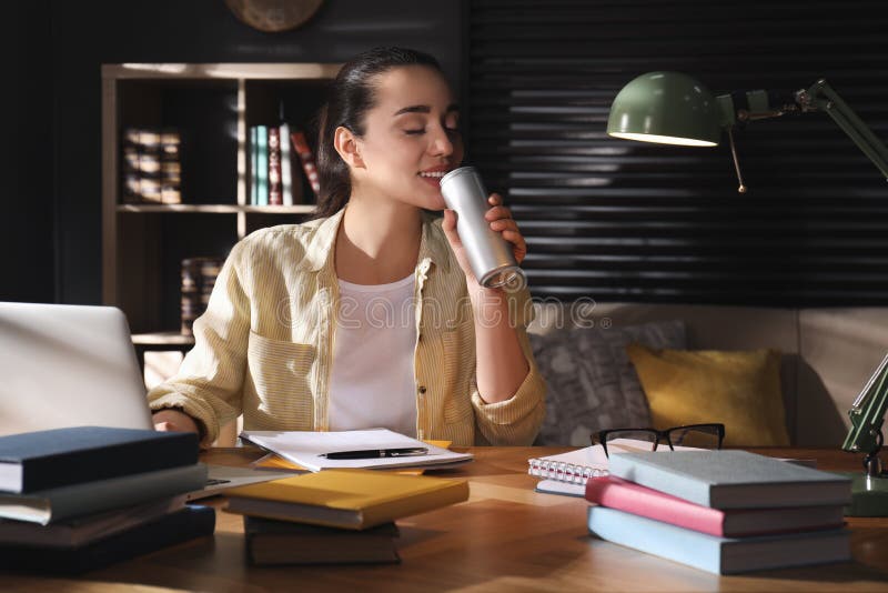 Young Woman with Energy Drink Studying at Home Stock Photo Image of energy, computer 219827584