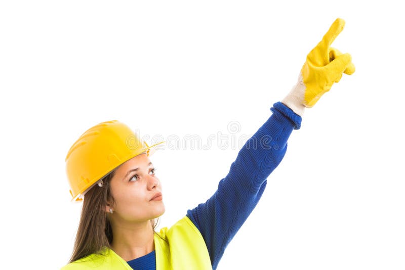 Young woman engineer pointing upward royalty free stock photography Young woman engineer pointing upward royalty free stock photography