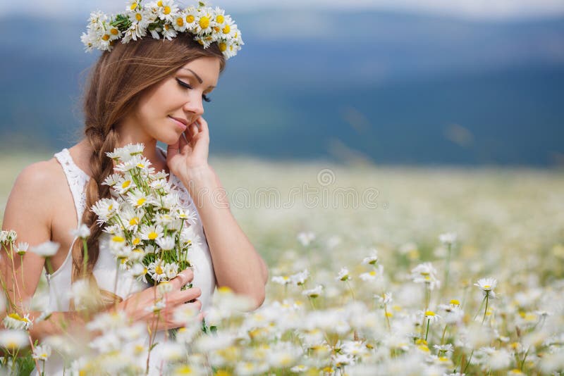 Young Woman in a Field of Blooming Daisies Stock Photo - Image of ...