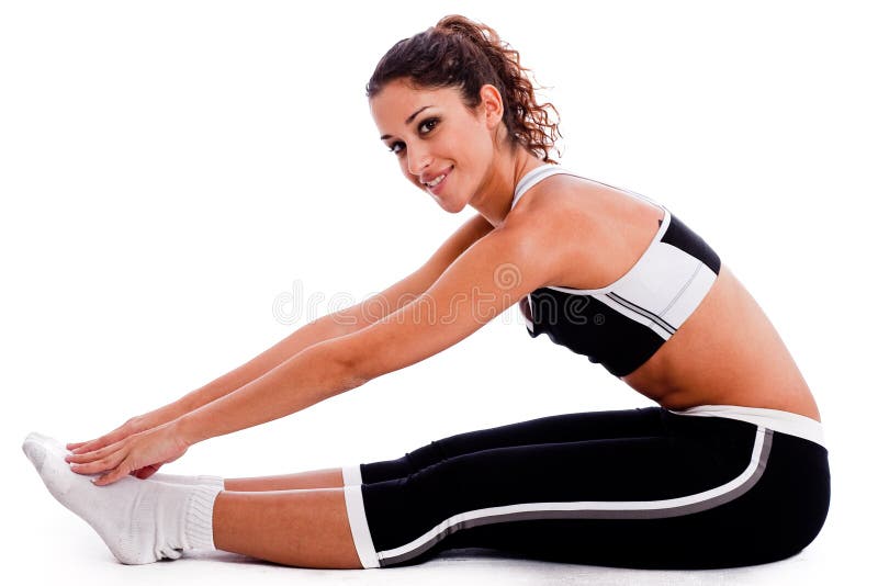 Young woman in fitness outfits stretching