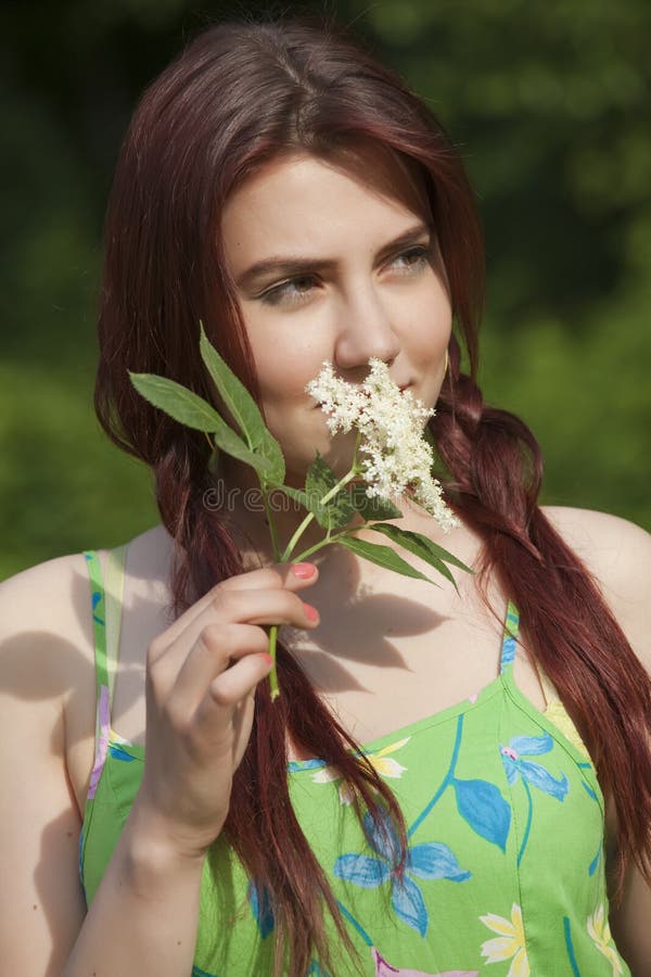 Young woman with flower