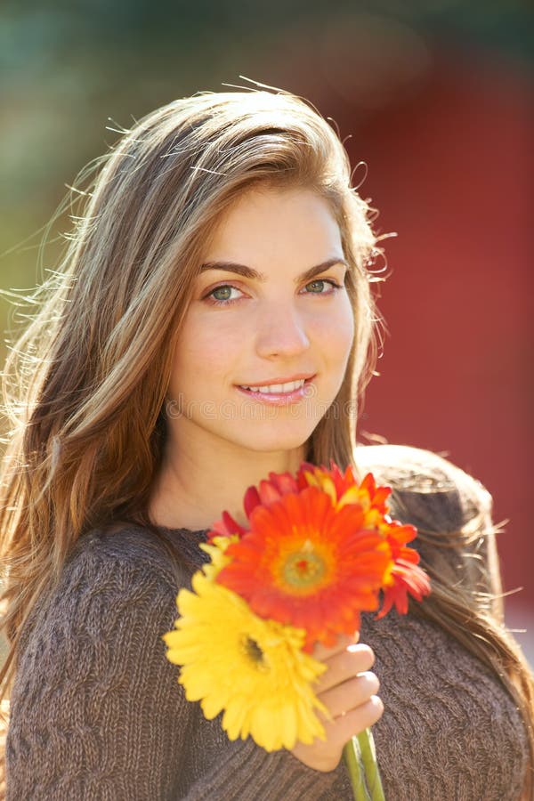 Young woman with flowers