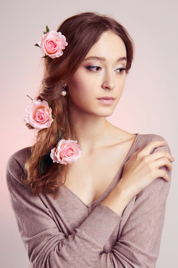 Young woman with flowers in hairs stock photography Young woman with flowers in hairs stock photography