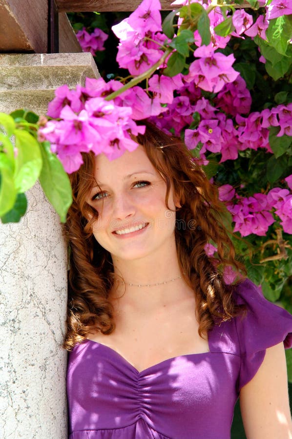 Young woman in garden stock photography