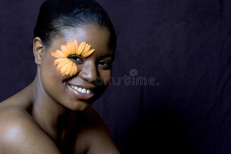 Young woman with a Gerbera Daisy Eye