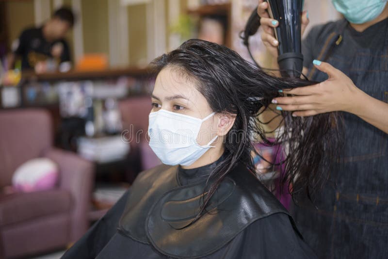 A Young Woman is Getting a Haircut in a Hair Salon , Wearing Face Mask for  Protection Covid-19 , Salon Safety Concept Stock Photo - Image of beauty,  care: 190580984