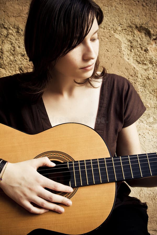 Young woman with guitar