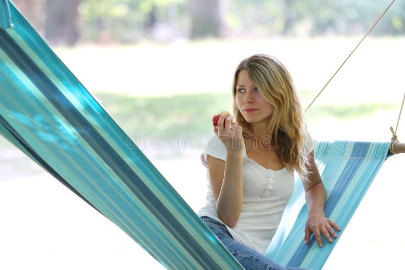 Young woman in a hammock