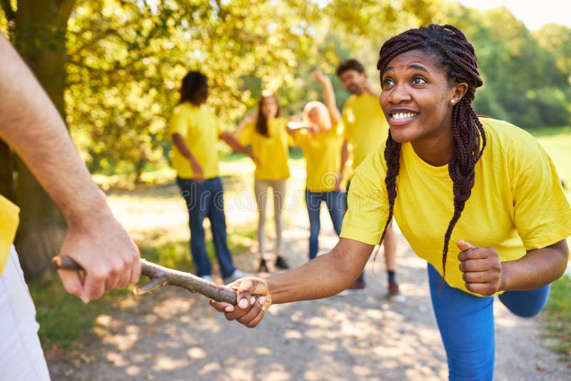 Young Woman Handing Over Baton at a Foot Race Stock Photo - Image of ...