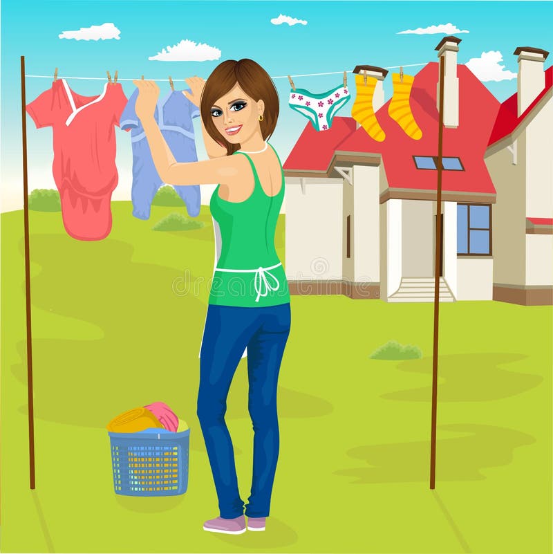 Young Woman Hanging Wet Clothes Out To Dry Next To Family ...