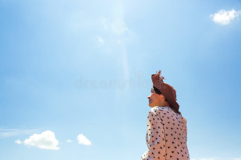 Young Woman in hat enjoying summer time Travel Lifestyle happy emotions vacations blue sky Smile girl tourist walking stock images Young Woman in hat enjoying summer time Travel Lifestyle happy emotions vacations blue sky Smile girl tourist walking stock images