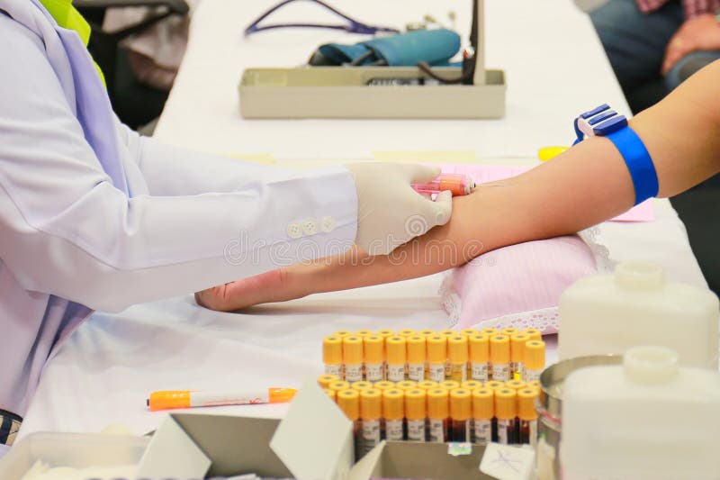 Medical Doctor Woman Looking On Test Tube With Blood Stock Image