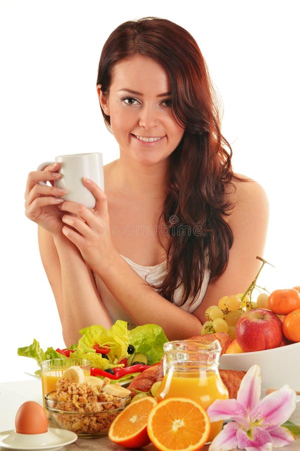 Young woman having breakfast. Balanced diet