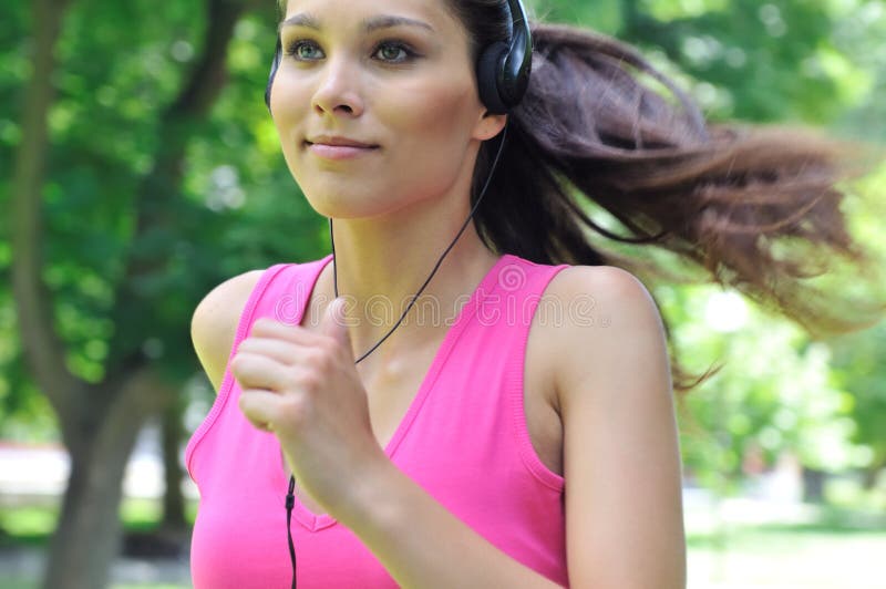 Young Woman with Headphones Running Stock Image Image of healthy