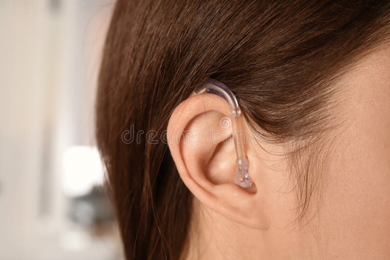 Young Woman with Hearing Aid Stock Photo Image of device, audiology