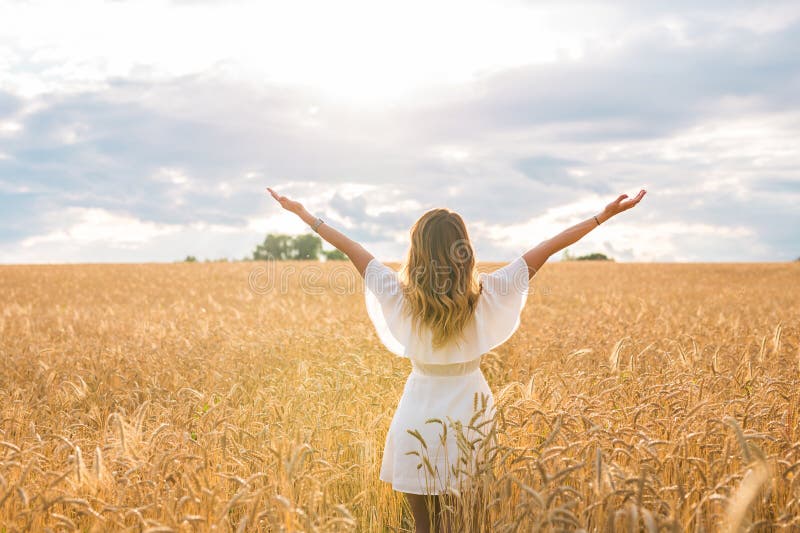 Young Woman with Her Arms Wide Spread is Enjoying in the Sunny Summer ...