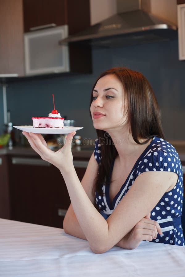 Young Woman is Dreaming about Cake Stock Image Image of food, indoors