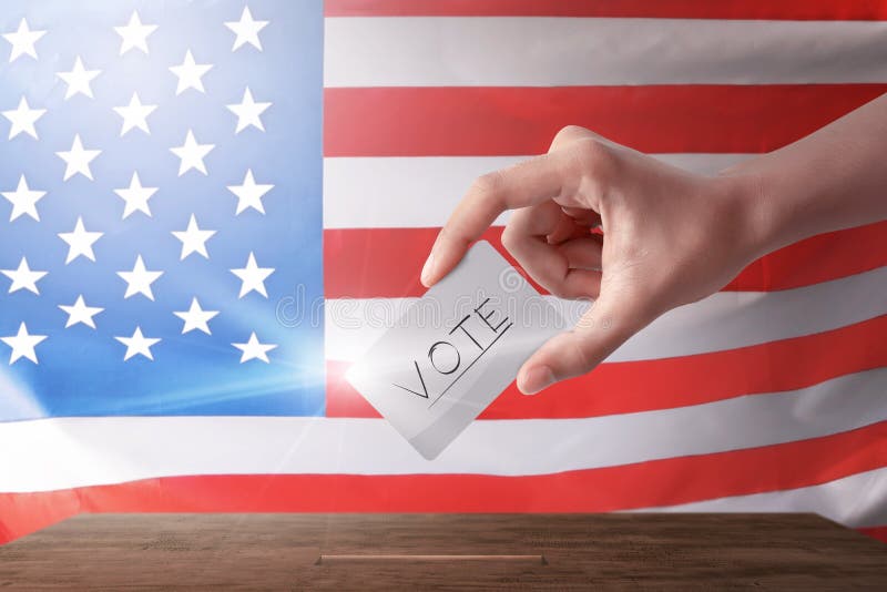 Young woman with a her vote in the voting booth royalty free stock photos