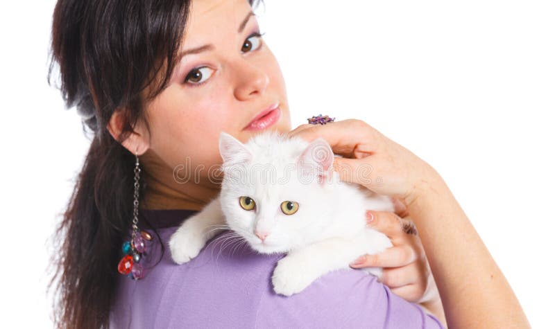 Young woman hold white cat.