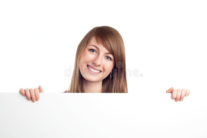 Young woman holding blank billboard