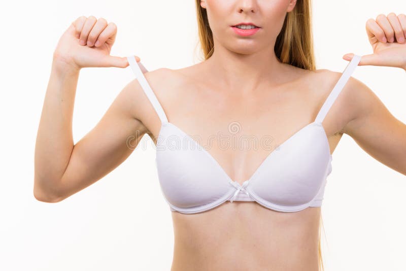 Young Woman Holding Bra Strap Stock Photo - Image of adjust, falling:  228355538