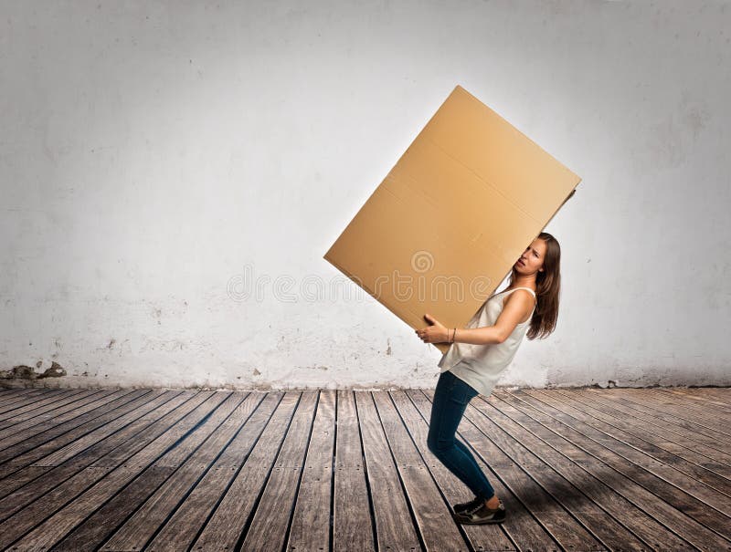 Young woman holding a cardbox stock photo Young woman holding a cardbox stock photo