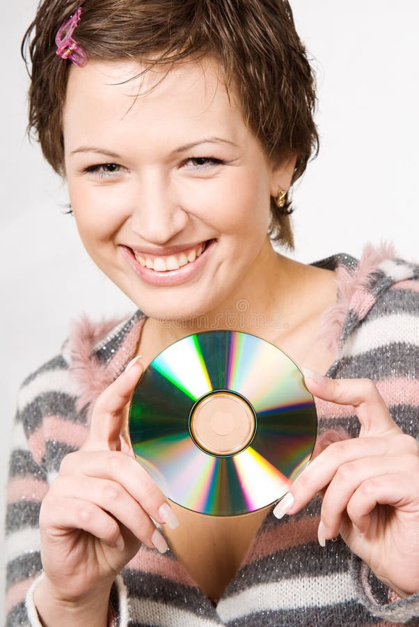 Young woman holding CD disk