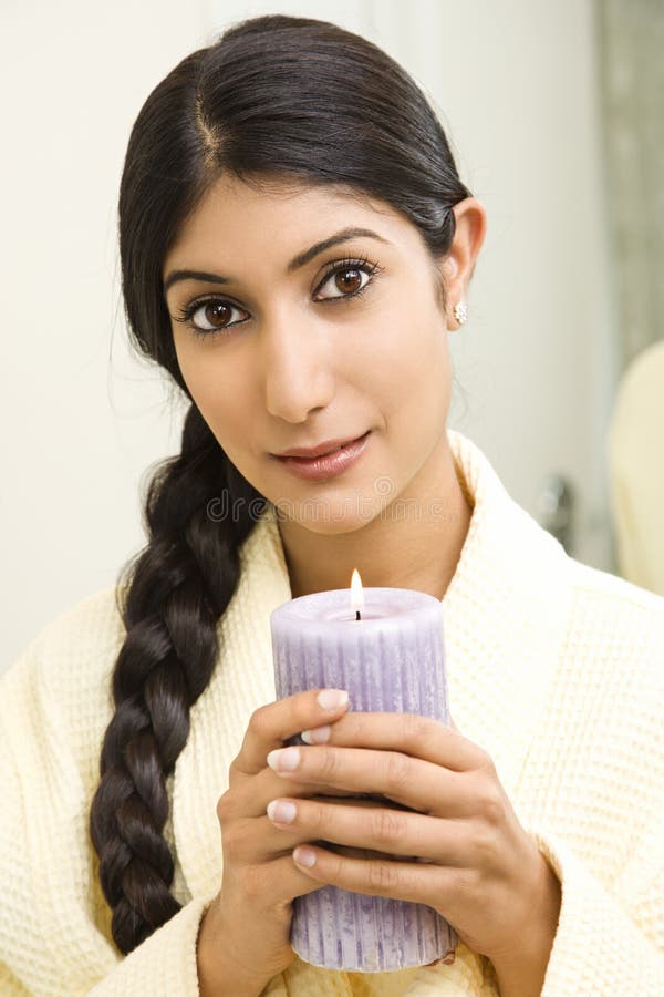 Young Woman Holding Lit Candle Stock Photo Image 2044978